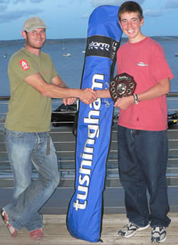 Paul Simmons handing over the Tushingham prize to Dan Simpson