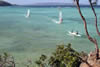 View from a hill looking over the windsurfing