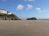 The view left along the beach towards town.