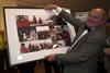 Kevin Proffitt with his montage of memories.