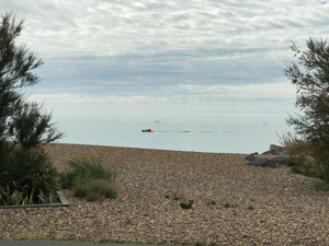  Boat goes past to the beach